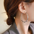 Mobius Twist Gold Hoop Earrings – Classic 50mm Statement Hoops for Women