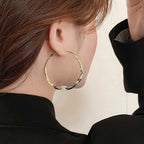 Mobius Twist Gold Hoop Earrings – Classic 50mm Statement Hoops for Women